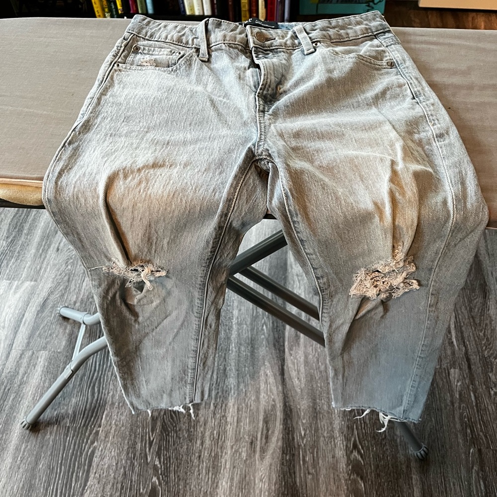 Size 4, universal slim, ripped, boyfriend jeans
